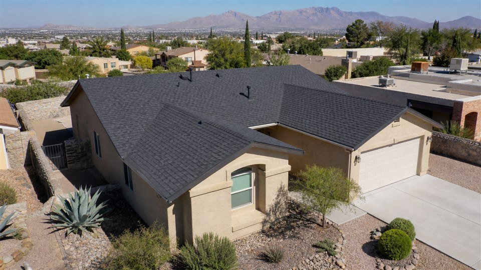 Charcoal architectural shingle roof on a Southwest El Paso home